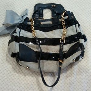 Used juice couture hand and shoulder bag